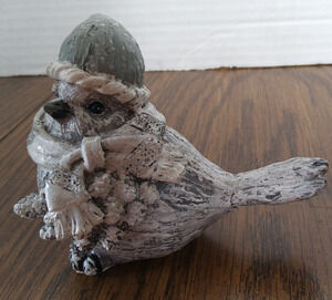 White And Gray Snowbird With Scarf And Pointed Hat